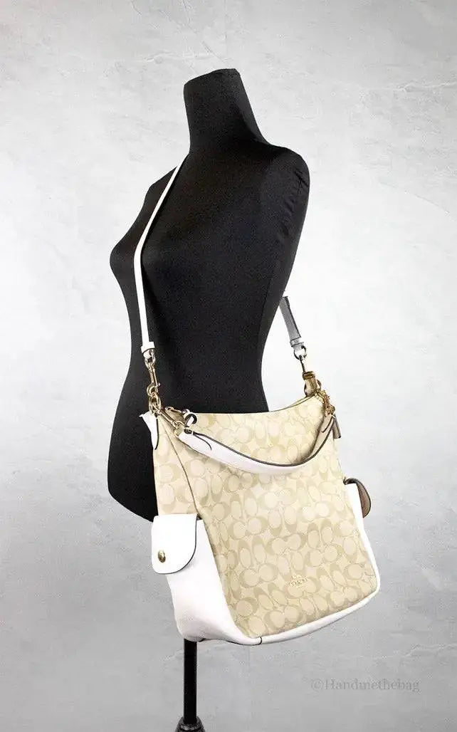 Coach Pennie Light Khaki Chalk Signature Coated Canvas Handbag - The 4 Season Clothing Brand